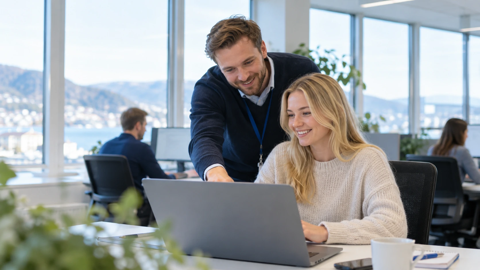 IT support professional assisting a user by phone and reviewing documentation